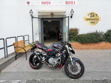 MV AGUSTA BRUTALE 750 S 

Immatricolato 2005, 749cc, 127Cv/93Kw, 58.000Km, Euro2. 

Rimangono sempre esclusi i costi :
-del passaggio di proprietÃ  pari ad euro 200,00
-messa su strada pari ad euro 300,00 che include l'attivazione della garanzia di 12 mesi completa, all' occorrenza controlli e/o tagliando completo preconsegna (olio,filtro olio, filtro aria e tutti i componenti necessari al ripristino), 12 mesi di garanzia estendibili a 24/36mesi in base al veicolo e copre i componenti non soggetti ad usura (dettagli in sede).

Con: Motore a 4 cilindri in linea, cambio manuale a 6 rapporti, raffreddamento a Liquido, forcella Marzocchi rovesciata, Forcellone monobraccio, doppio freno a disco anteriore da 310mm e al posteriore da 210mm, cerchi da 17â€. 
Accessoriata con : Perti in Carbonio, Ammortizzatore di sterzo, tamoni laterali Kit catena, parafango posteriore, specchietti al manubrio, leve freno e frizione regolabili, porta targa sportivo, scarico Arrow con DB Killer. 

I NOSTRI SERVIZI : 
-Acquisto diretto con pagamento immediato 
-conto vendita
-vendita auto, moto e scooter usati e garantiti
-vendita veicoli d'epoca
-permuta auto con moto e viceversa
-noleggio breve e lungo termine
-finanziamenti personalizzati (rata costante,mini e  maxi rate, leasing)
-assistenza post-vendita con societÃ  di garanzie e officine partner
-assicurazioni
-consulenze e stime per acquisti tra privati

VISITA il nostro sito internet: automotousateroma.it oppure scarica la nostra App: automotousateroma dall' Apple store o Play store per restare aggiornato sui nostri ultimi arrivi.

VIENI A TROVARCI PER VEDERE DAL VIVO QUESTO VEICOLO :
Auto Moto Usate Roma s.r.l.Via Appia Nuova 23, 00047, Marino (RM) (adiacente Sorelle Ramonda)

*************

HAI UNA PERMUTA?
compila il form sull'App o nel nostro sito automotousateroma.it
oppure inviaci foto e descrizione (modello anno km motore ...)
al nostro numero whatsapp : Cell. 366-6562866 o 351-4646876 Fisso 06-7215841 e-mail :  info@automotousateroma.it

*************
La Auto Moto Usate Roma Srl declina ogni responsabilitÃ  per eventuali involontarie incongruenze che non rappresentano in alcun modo un impegno contrattuale e invitano i clienti a verificare sempre dal vivo la correttezza dei dati che potrebbero non coincidere con lâ€™effettivo equipaggiamento del veicolo spesso dovuto alla incompatibilitÃ  dei dati trasmessi sulle varie piattaforme web.