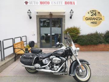 HARLEY DAVIDSON FLSTC SOFTAIL HERITAGE 1584

Immatricolato 2009, 1584cc, 71Cv/52Kw, 7.000Km, Euro3
*** Moto UNICOPROPRIETARIO *** 

Il prezzo proposto di euro 13.900,00 Ã¨ legato alla promozione web che prevede un acquisto tramite finanziamento, Info in sede.
Il prezzo a Listino senza promo e senza vincoli Ã¨ di euro 14.900,00.

Rimangono sempre esclusi i costi :
-del passaggio di proprietÃ  pari ad euro 200,00
-messa su strada pari ad euro 400,00 che include l'attivazione della garanzia di 12 mesi completa, all' occorrenza controlli e/o tagliando completo preconsegna (olio,filtro olio, filtro aria e tutti i componenti necessari al ripristino), 12 mesi di garanzia estendibili a 24/36mesi in base al veicolo e copre i componenti non soggetti ad usura (dettagli in sede).

 Con: Motore Bicilindrico a V, cambio manuale a 6 rapporti, Raffreddamento ad Aria, trasmissione finale a cinghia, dischi freno da 292mm, cerchi da 16â€. 
Accessoriato con: Parabrezza, paramotore, fari di profonditÃ , schienalino, borse laterali in pelle, mantenitore di batteria.

I NOSTRI SERVIZI : 
-Acquisto diretto con pagamento immediato 
-conto vendita
-vendita auto, moto e scooter usati e garantiti
-vendita veicoli d'epoca
-permuta auto con moto e viceversa
-noleggio breve e lungo termine
-finanziamenti personalizzati (rata costante,mini e  maxi rate, leasing)
-assistenza post-vendita con societÃ  di garanzie e officine partner
-assicurazioni
-consulenze e stime per acquisti tra privati

VISITA il nostro sito internet: automotousateroma.it oppure scarica la nostra App: automotousateroma dall' Apple store o Play store per restare aggiornato sui nostri ultimi arrivi.

VIENI A TROVARCI PER VEDERE DAL VIVO QUESTO VEICOLO :
Auto Moto Usate Roma s.r.l.Via Appia Nuova 23, 00047, Marino (RM) (adiacente Sorelle Ramonda)

*************

HAI UNA PERMUTA?
compila il form sull'App o nel nostro sito automotousateroma.it
oppure inviaci foto e descrizione (modello anno km motore ...)
al nostro numero whatsapp : Cell. 366-6562866 o 351-4646876 Fisso 06-7215841 e-mail :  info@automotousateroma.it

*************
La Auto Moto Usate Roma Srl declina ogni responsabilitÃ  per eventuali involontarie incongruenze che non rappresentano in alcun modo un impegno contrattuale e invitano i clienti a verificare sempre dal vivo la correttezza dei dati che potrebbero non coincidere con lâ€™effettivo equipaggiamento del veicolo spesso dovuto alla incompatibilitÃ  dei dati trasmessi sulle varie piattaforme web.